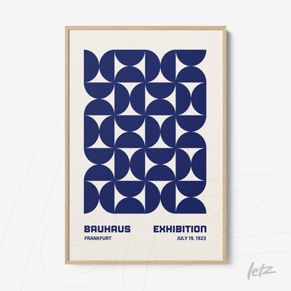 bauhaus exhibition poster in frankfurt featuring geometric blue design in natural frame