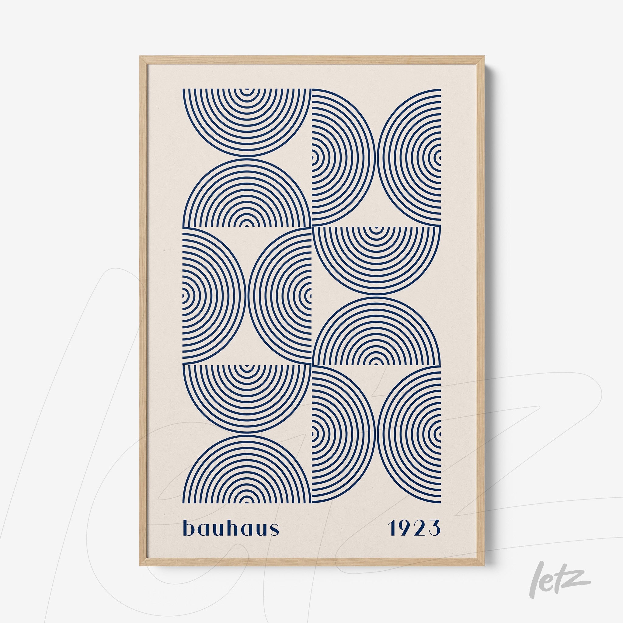 decorative Bauhaus style art with geometric blue semicircle pattern in light wood frame