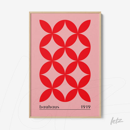 poster with red geometric pattern on pink background and 'bauhaus 1919' text in light frame