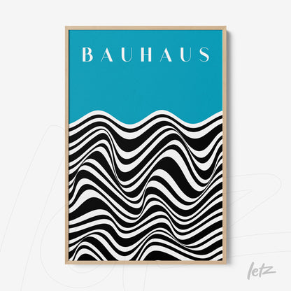 framed art with black and white wavy pattern on blue background in light wood frame