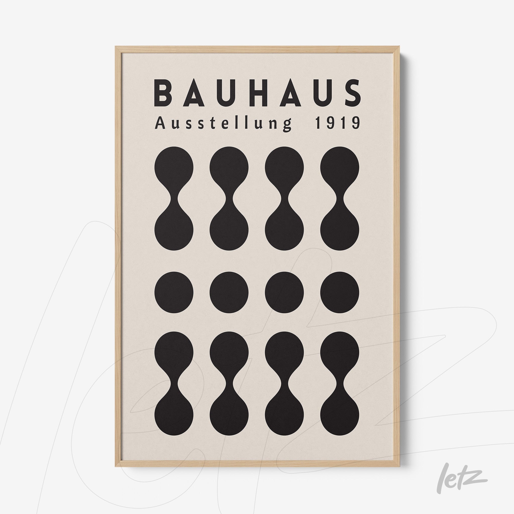 framed geometric design poster of bauhaus in light wood frame
