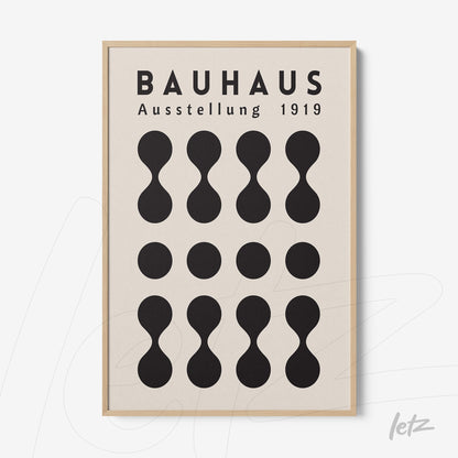 framed geometric design poster of bauhaus in light wood frame