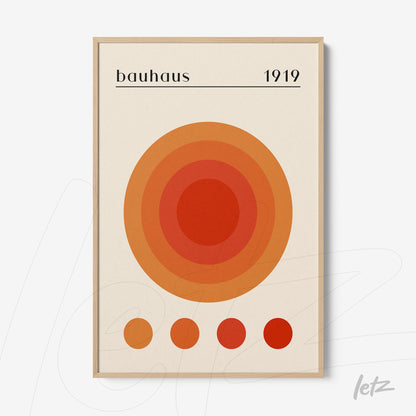 printed bauhaus poster with orange concentric circles on light frame