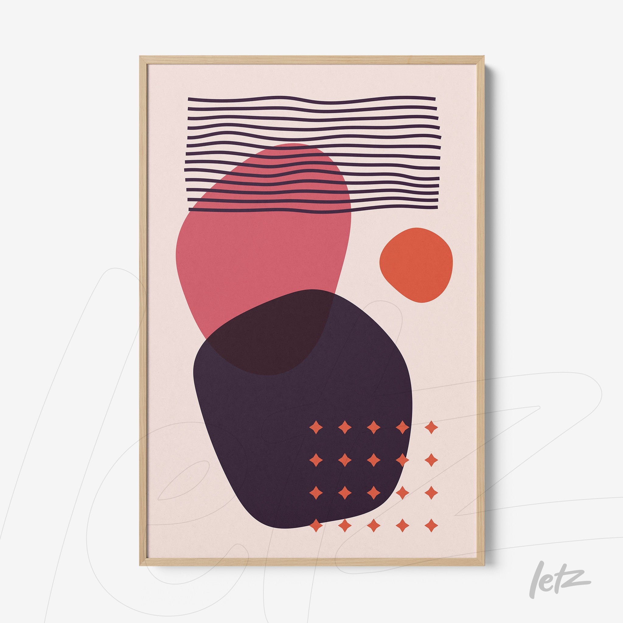 abstract wall art featuring colorful geometric shapes in a light wood frame