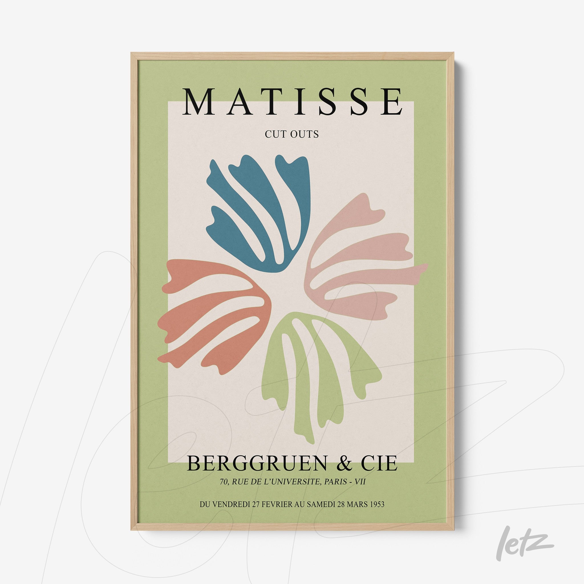framed contemporary art featuring stylized leaves in soft colors with light wood frame