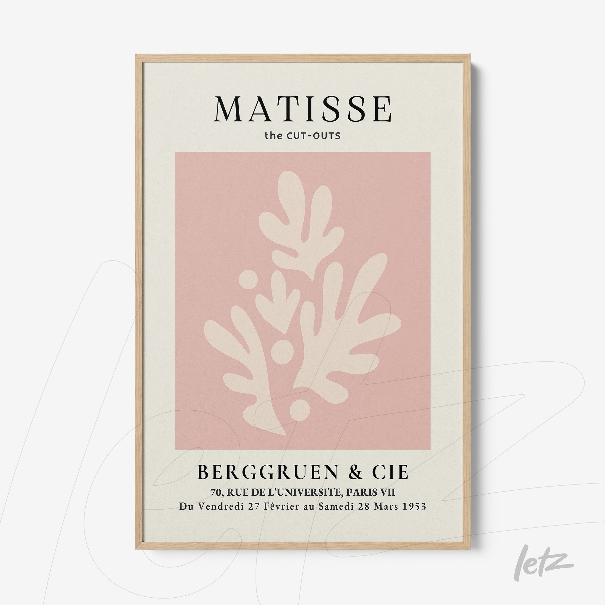 framed wall art featuring abstract shapes in pink and cream with light frame, showcasing organic forms and black text