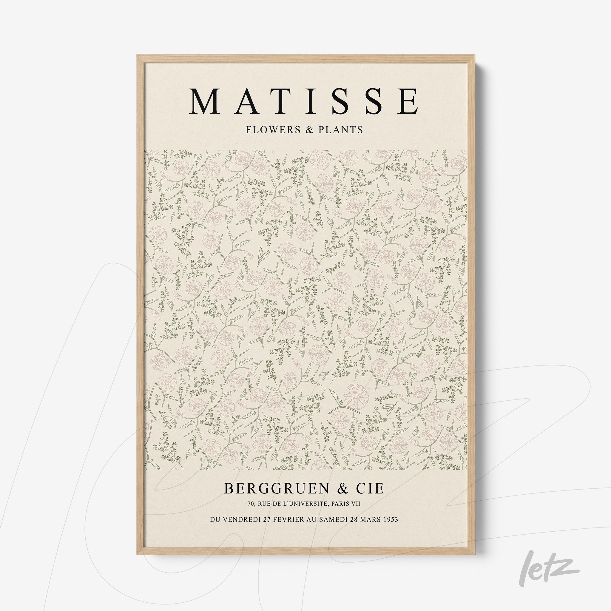 framed wall art featuring a floral and plant illustration on a light background with bold text and light wood frame