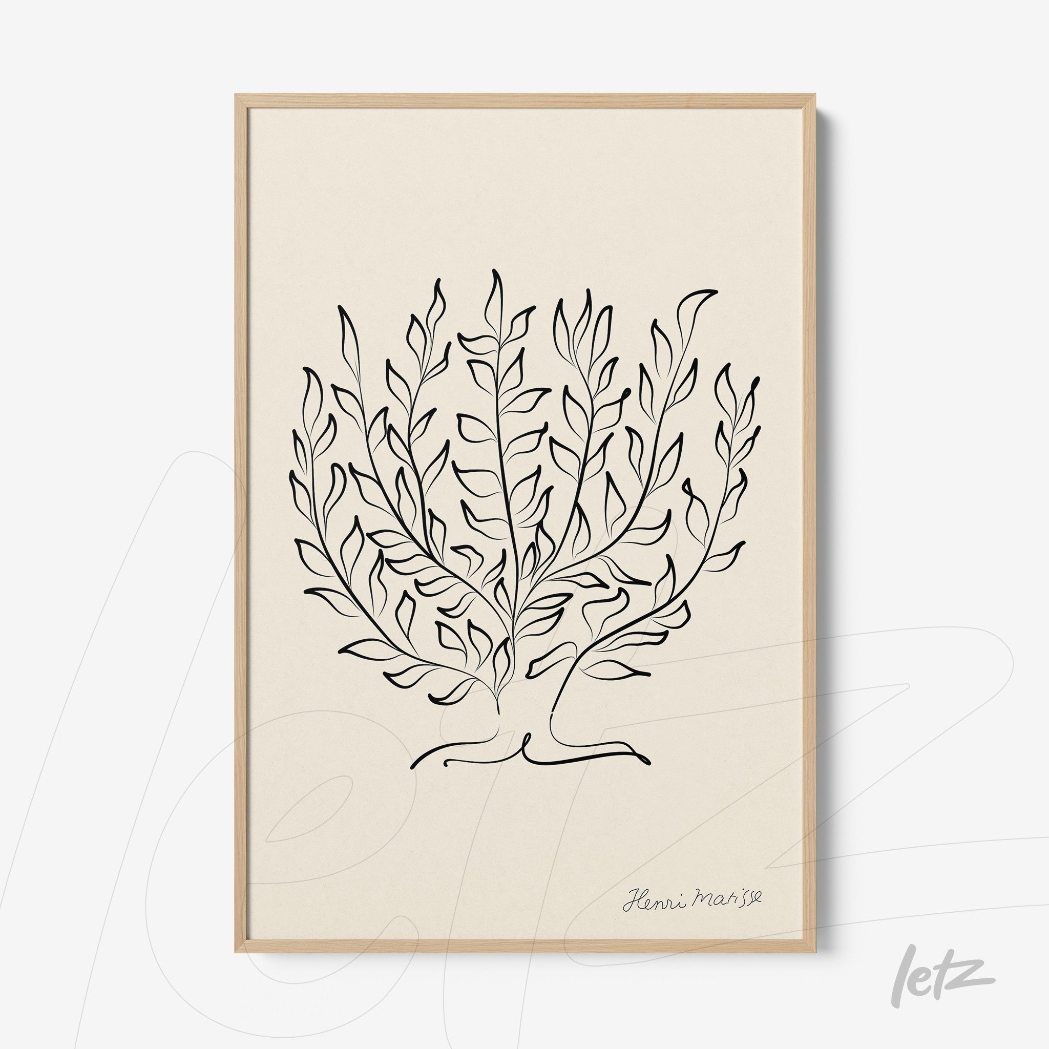 minimalistic wall art featuring stylized leaves design in light wooden frame