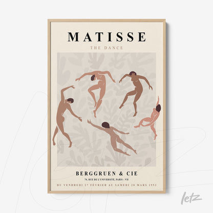 framed modern art print of dancing figures in terracotta tones on light background with light wood frame