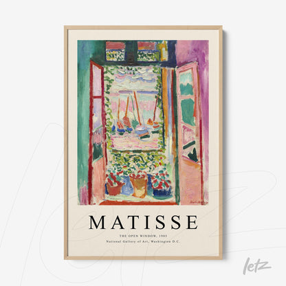 decorative wall art featuring henri matisse's 'the open window', framed in light wood with a colorful floral background