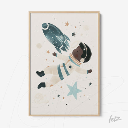 framed illustration of an astronaut floating in space with stars and a rocket, light wood frame