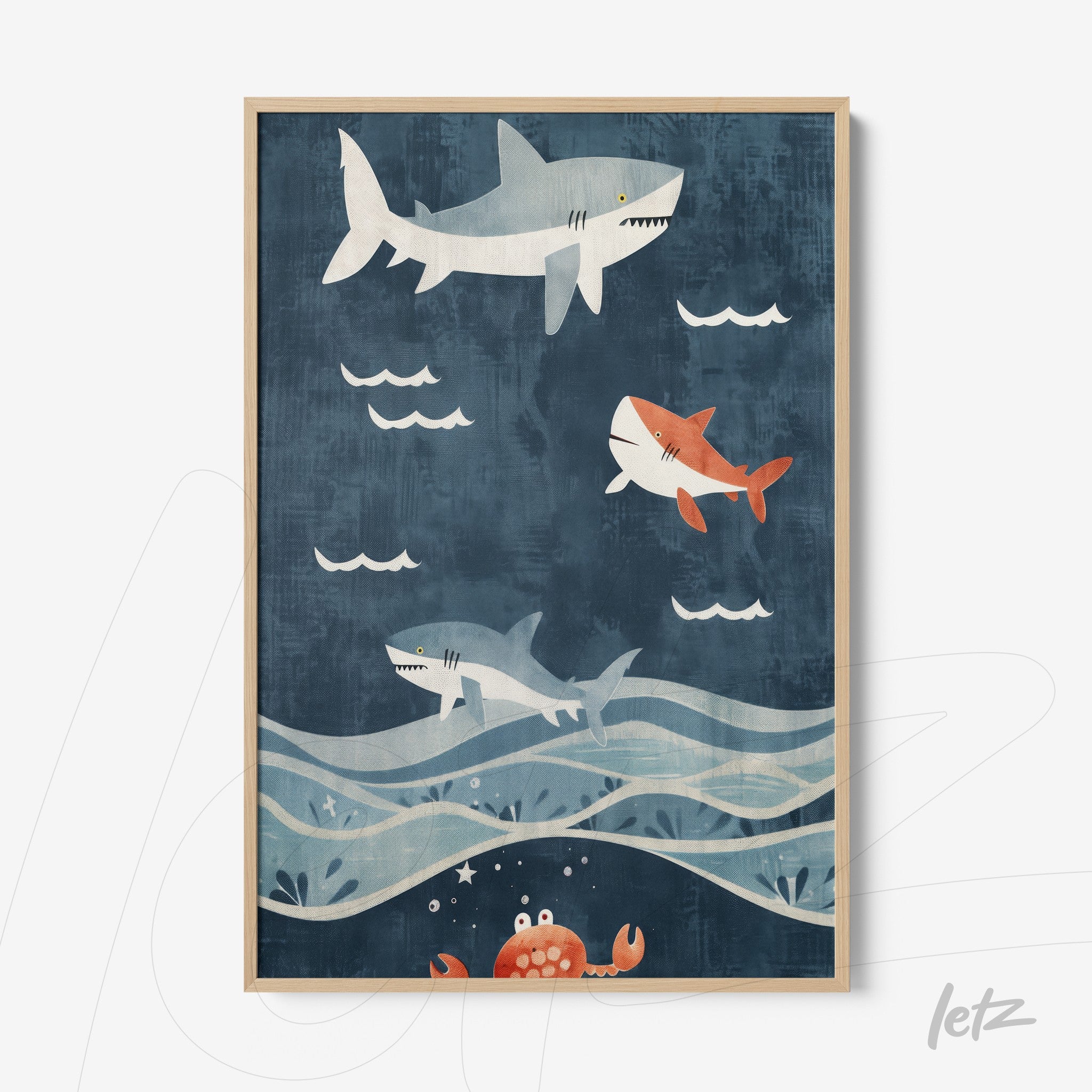framed wall art depicting sharks and a crab against a navy blue background with waves