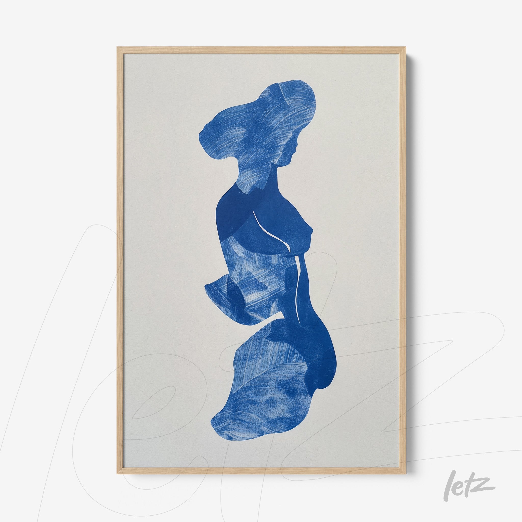 framed abstract art featuring blue silhouette of a woman with light frame