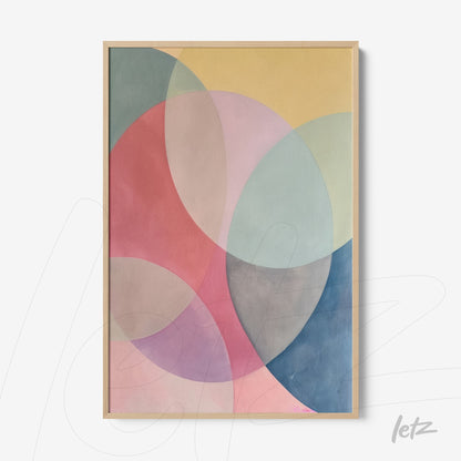 abstract wall art in pastel colors on yellow background with light wood frame