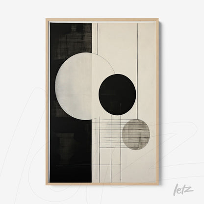 abstract artwork in black and white featuring circles of varying sizes on a soft background, framed with a light wood frame