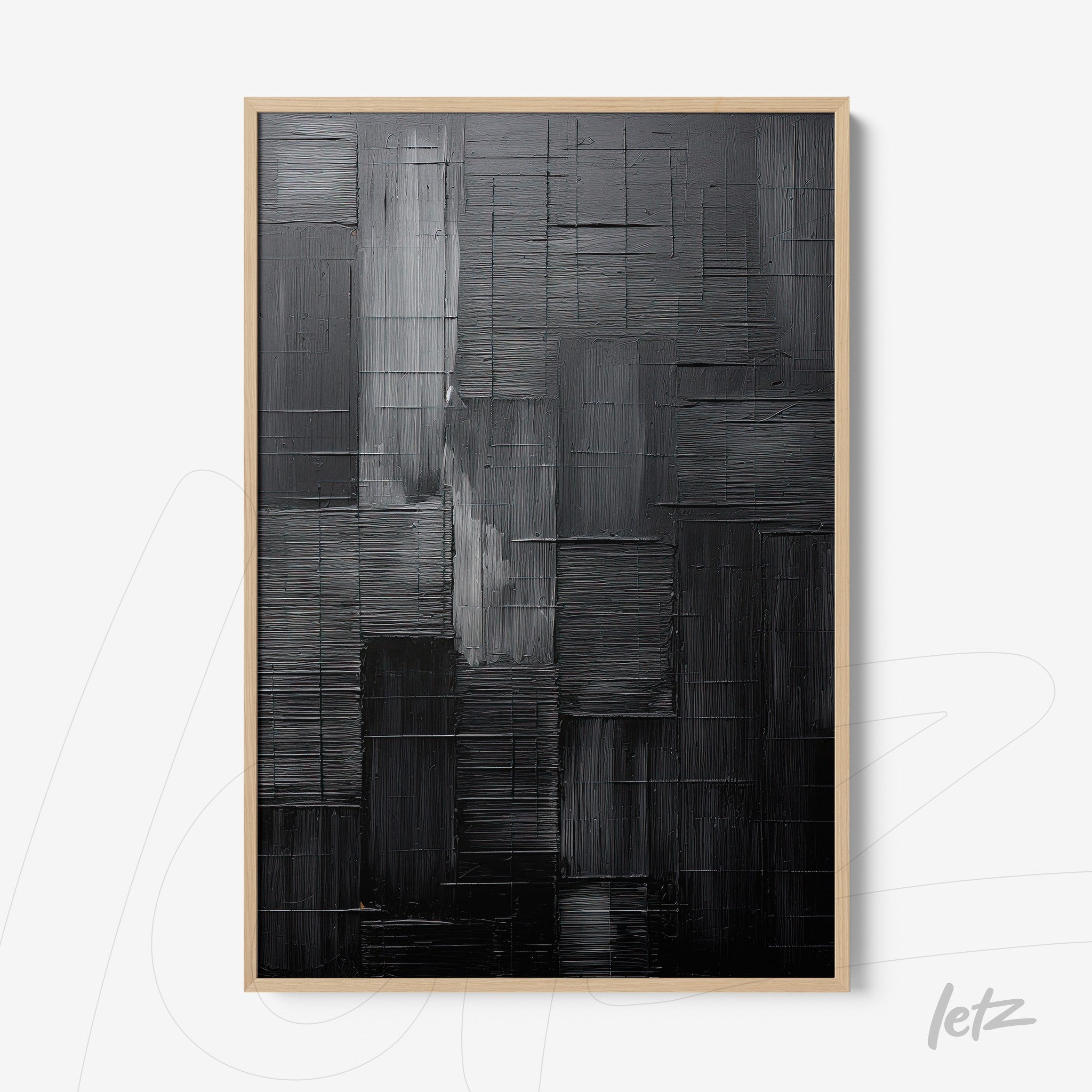 modern wall art featuring an abstract textured design in black tones with light wood frame