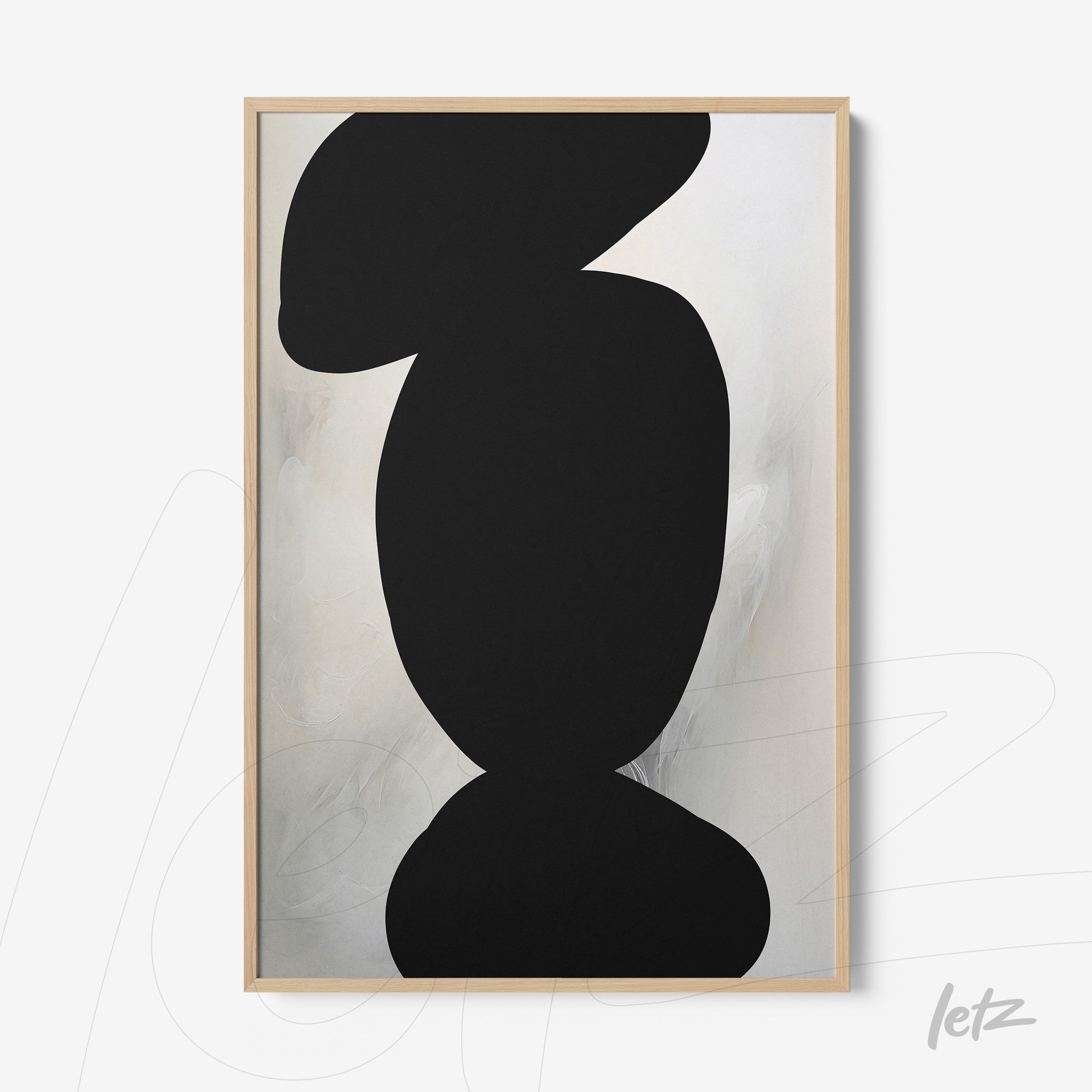 framed abstract wall art in black and white featuring organic shapes with a light wood frame