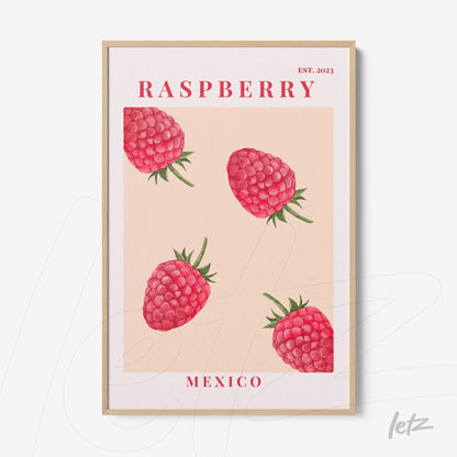 framed wall art featuring raspberries on a pink background with light wood frame