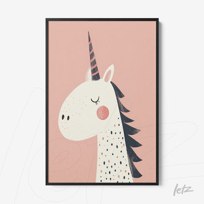 framed wall art featuring a playful unicorn illustration with a pink background and black frame