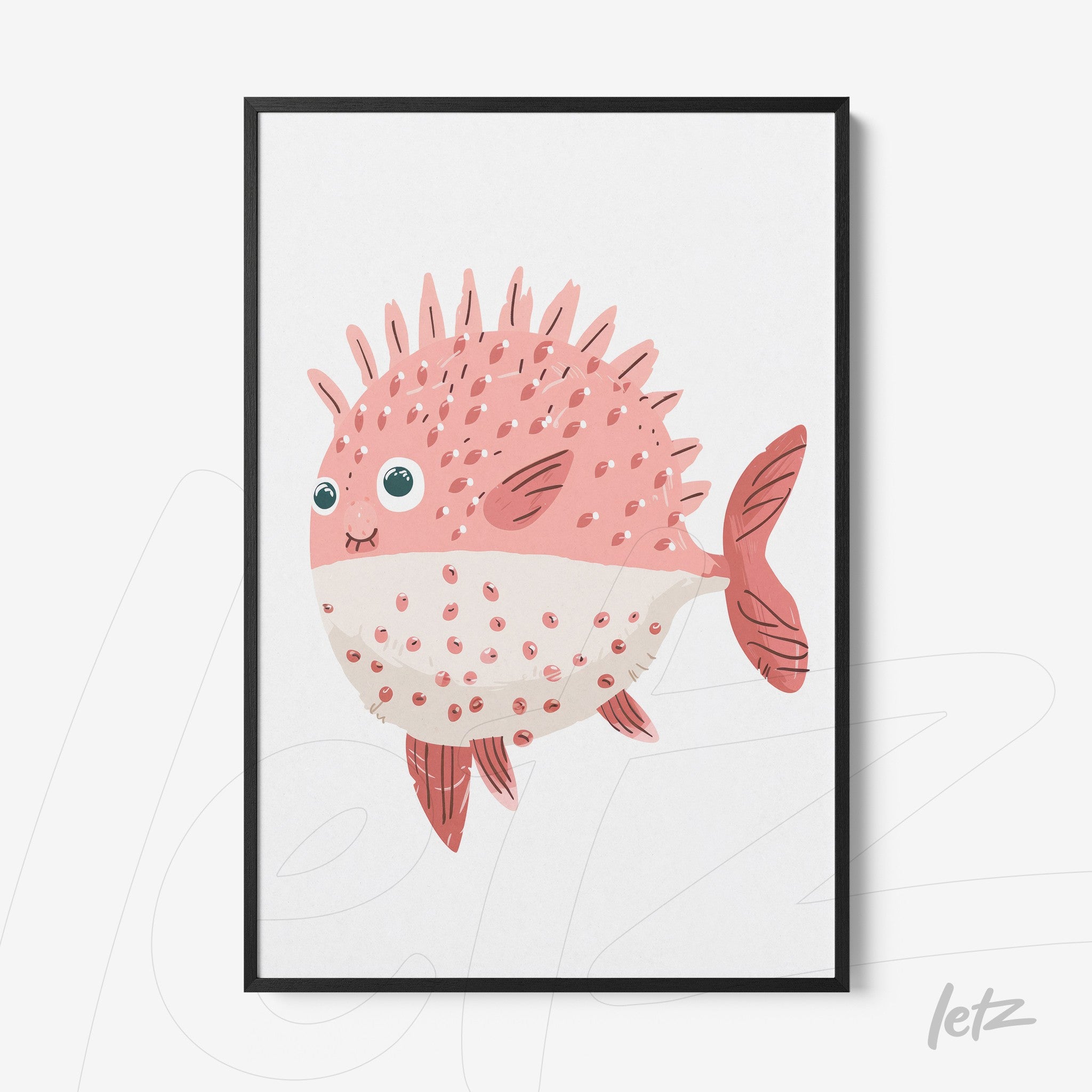 framed artwork of a cute pink fish with spikes and big eyes in a black frame