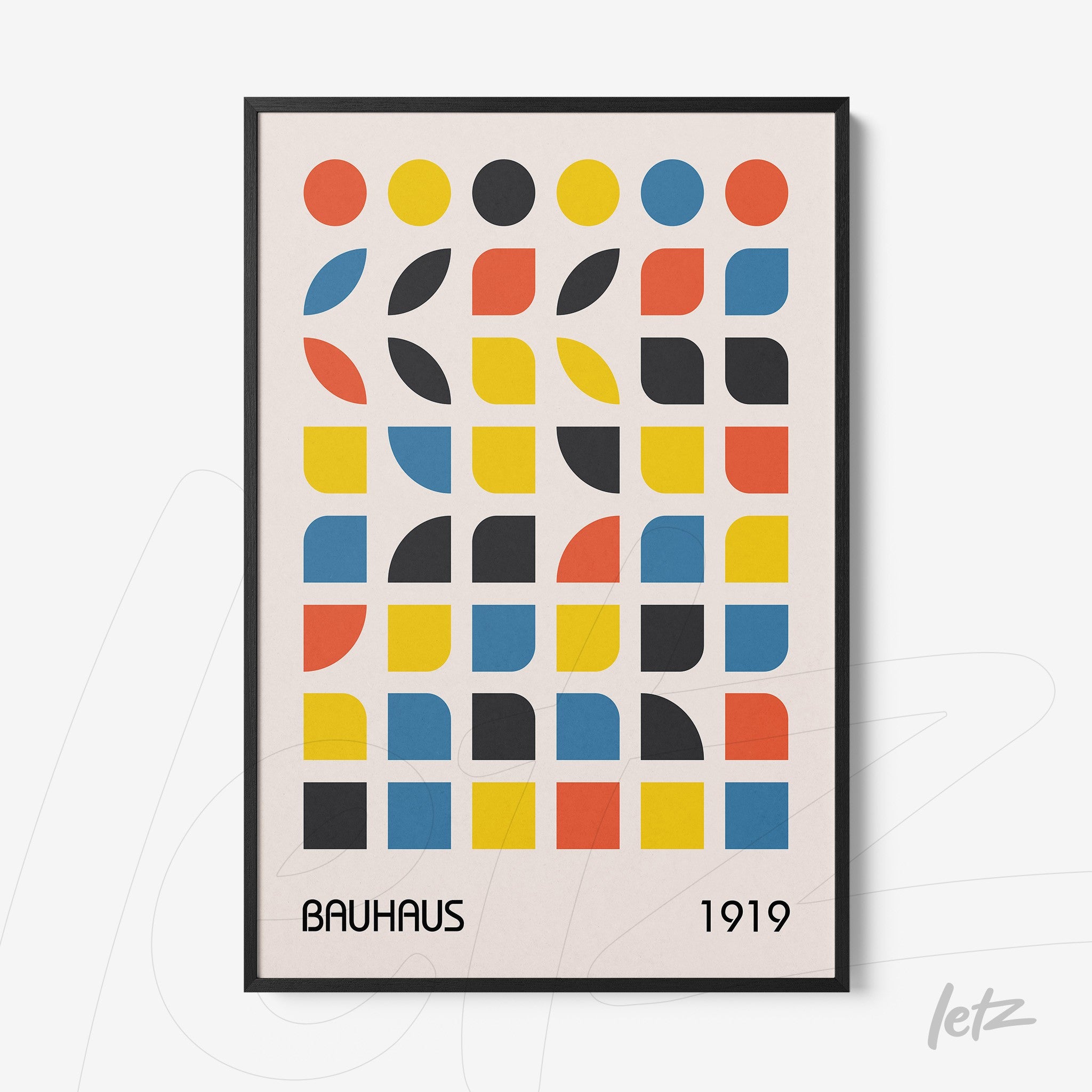 framed wall art with colorful geometric design in Bauhaus style and black border