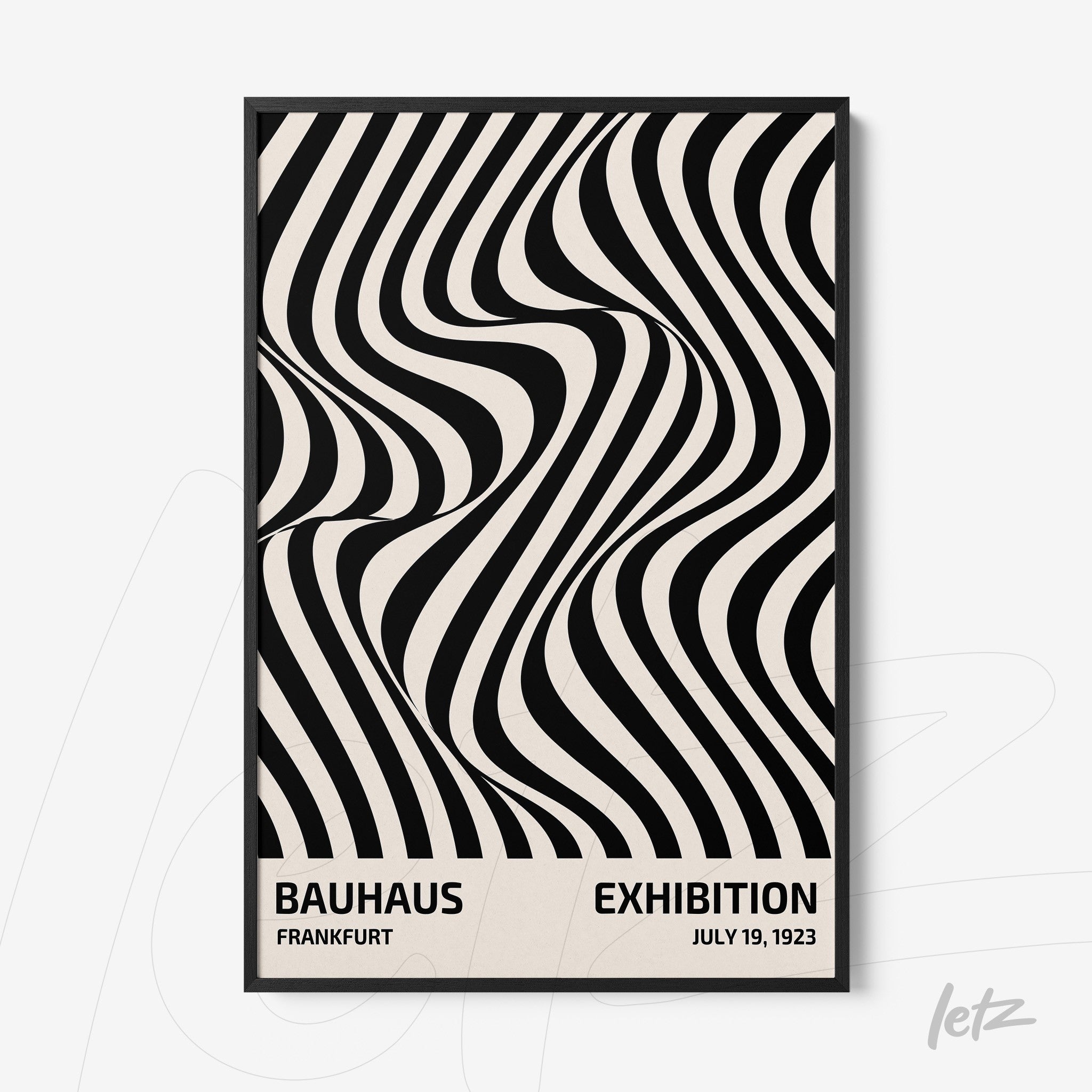 printed poster with black and white wavy geometric patterns in a thin black frame displayed against a white wall