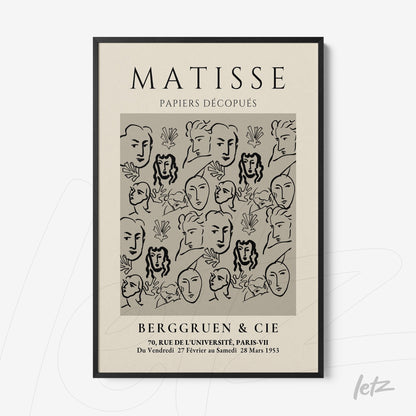 modern style framed artwork featuring feminine faces in black lines on a gray background with a black frame