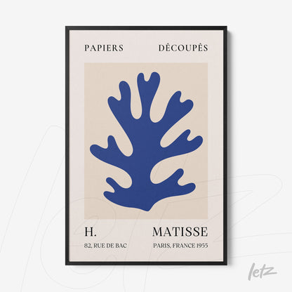 framed wall art with organic cut-out shapes in blue on light background