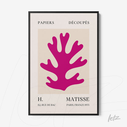 framed wall art featuring a modern abstract design of a vibrant pink coral shape with a thin black frame and neutral background