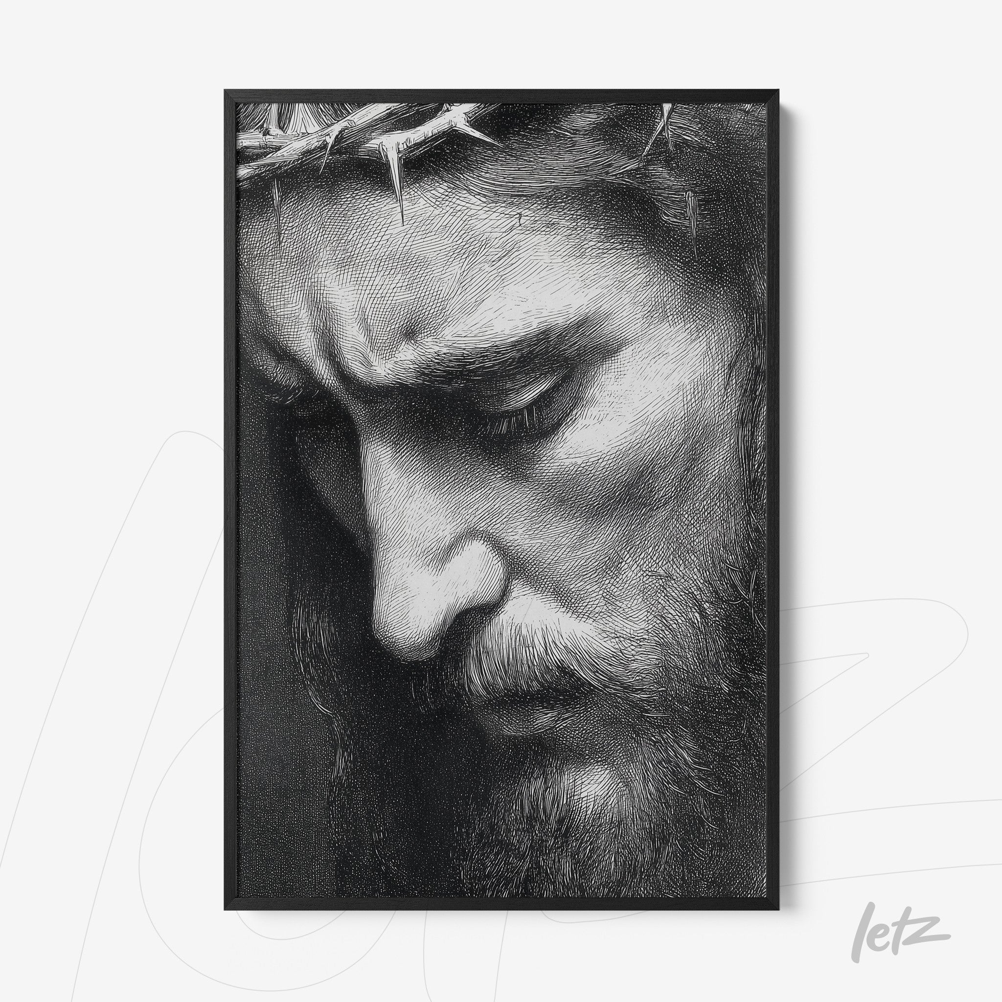 black and white framed artwork depicting a detailed portrait of Jesus Christ wearing a crown of thorns with a thin black frame