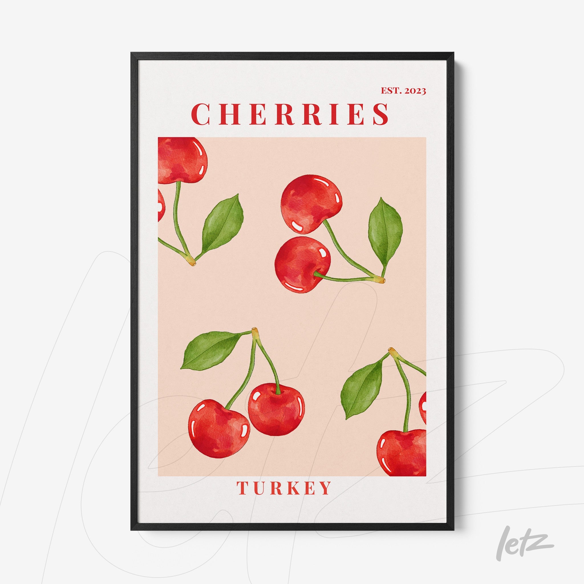framed artwork featuring red cherries on a light pink background with black frame and bold red text