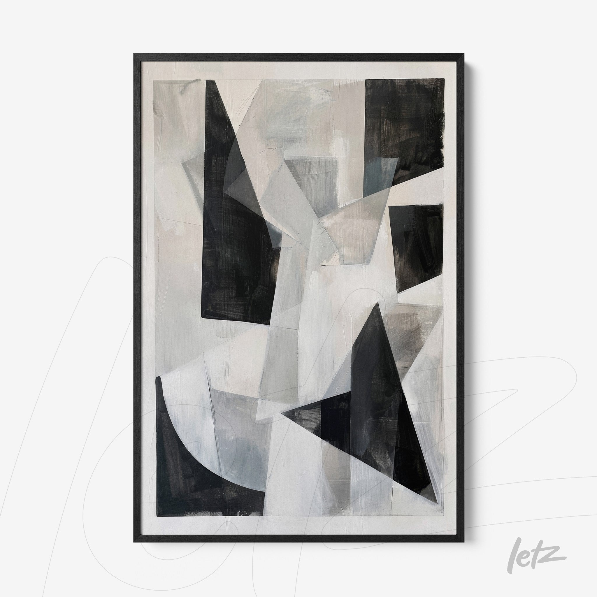 abstract wall art in black, white, and gray featuring geometric shapes with black frame