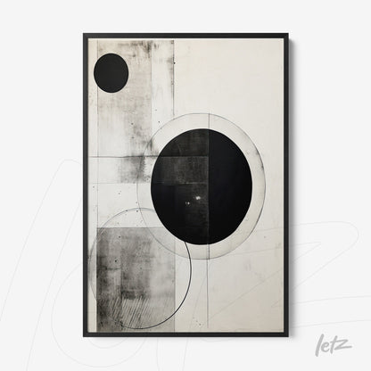 abstract wall art featuring black and white circles in various arrangements framed in black