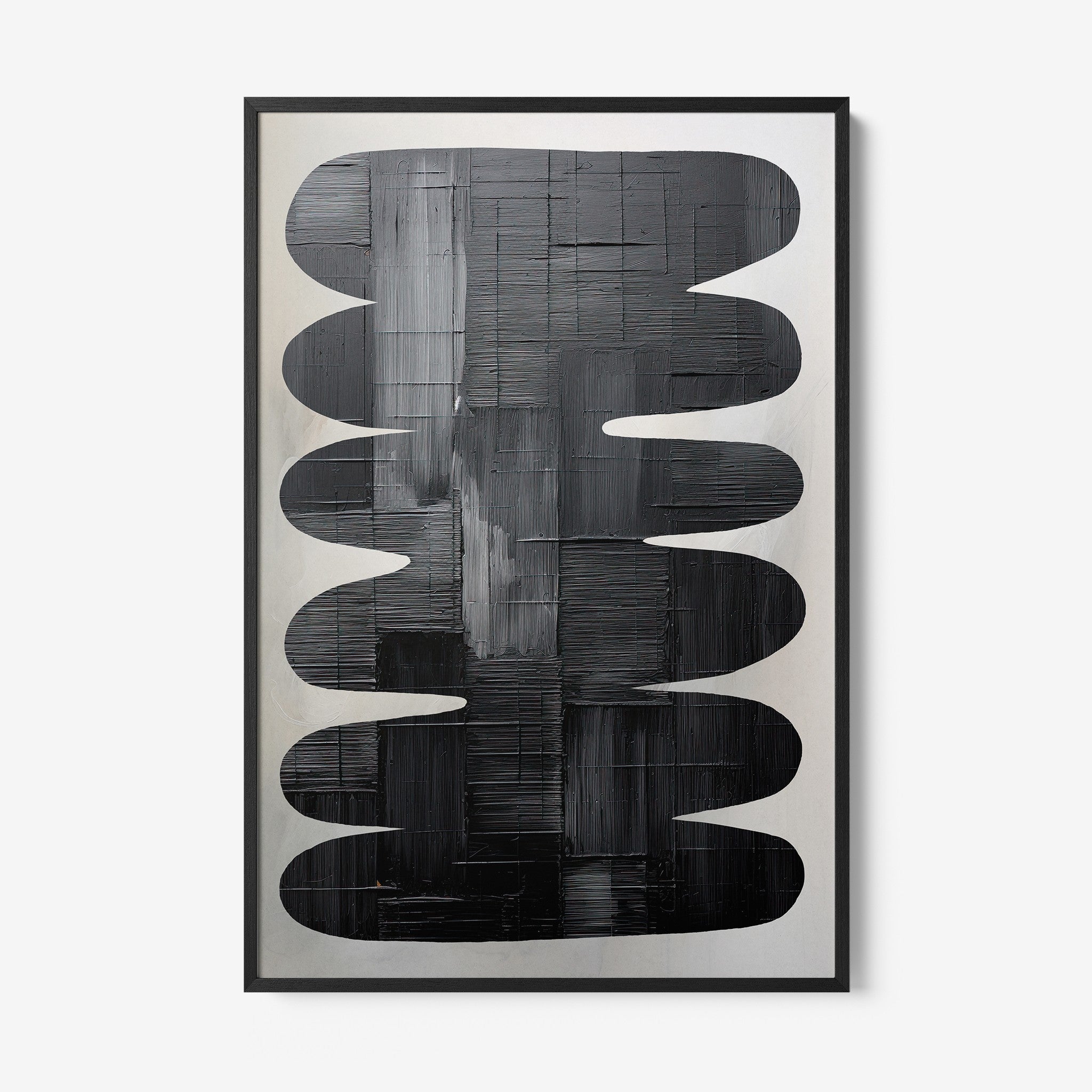 abstract canvas wall art featuring organic shapes in black and gray tones with black frame
