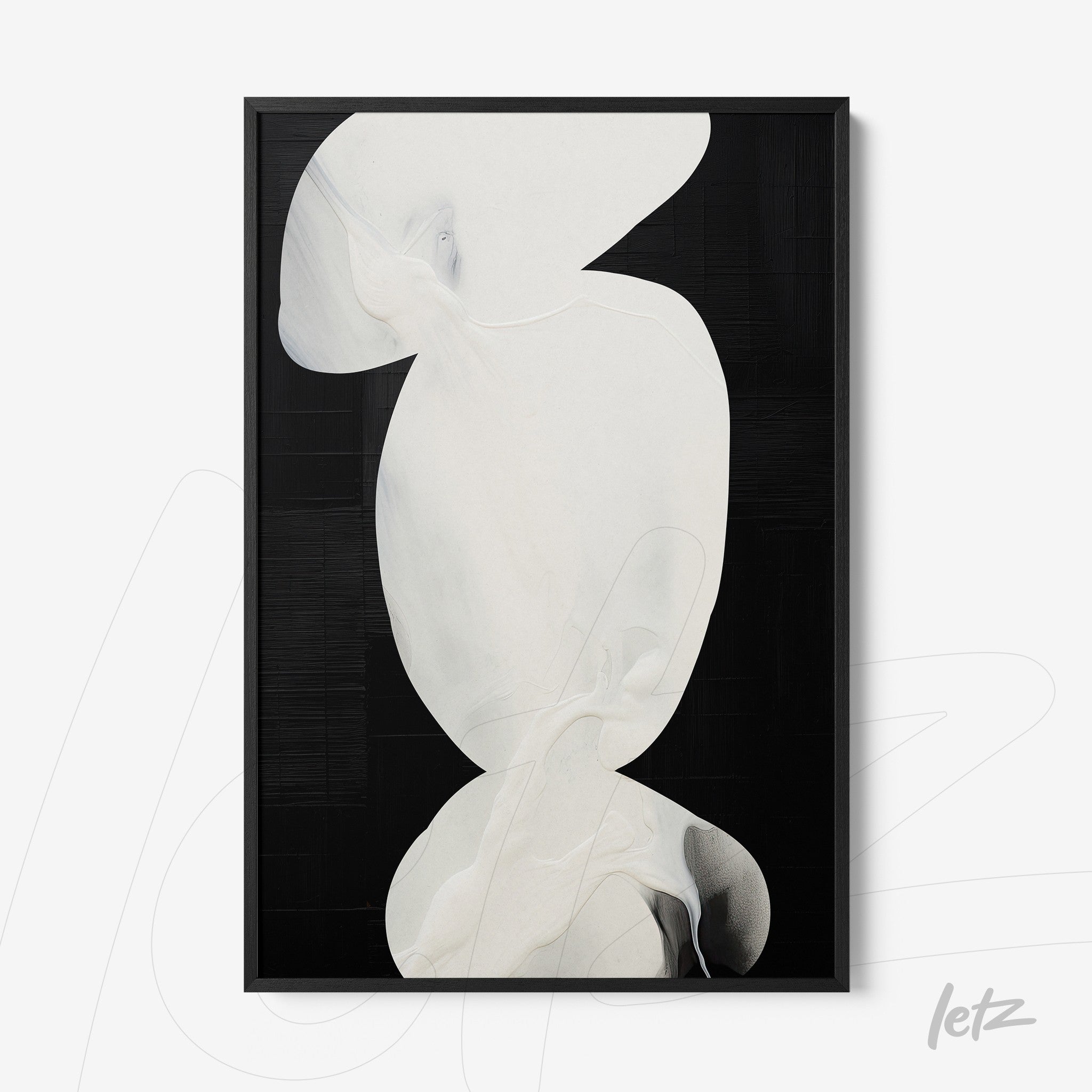 abstract framed wall art with white shapes on a black background
