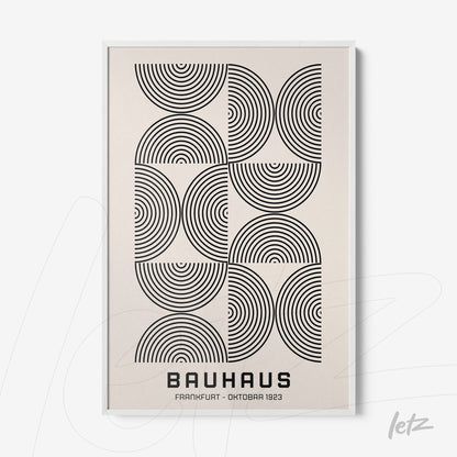 poster with black and white geometric art featuring concentric circles displayed in a white frame