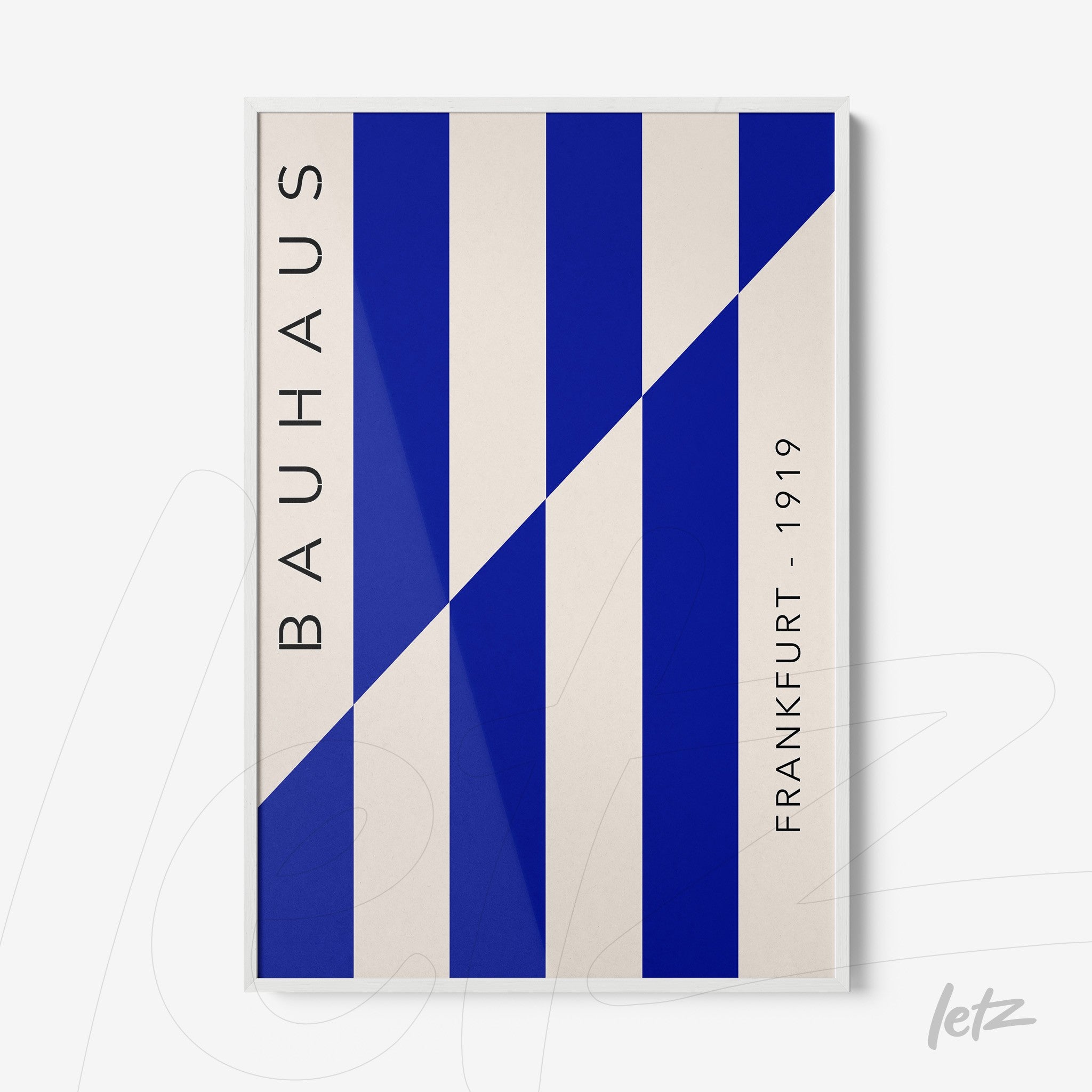 poster print featuring geometric design in blue and white, thin white frame with side text 'bauhaus frankfurt - 1919'