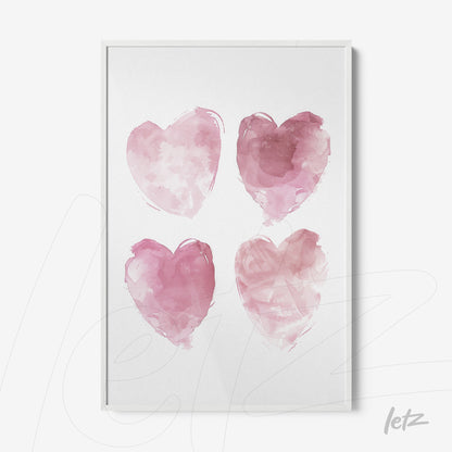 framed art featuring four stylized hearts in shades of pink