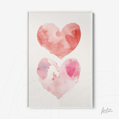 framed watercolor art of two hearts in shades of pink with white frame
