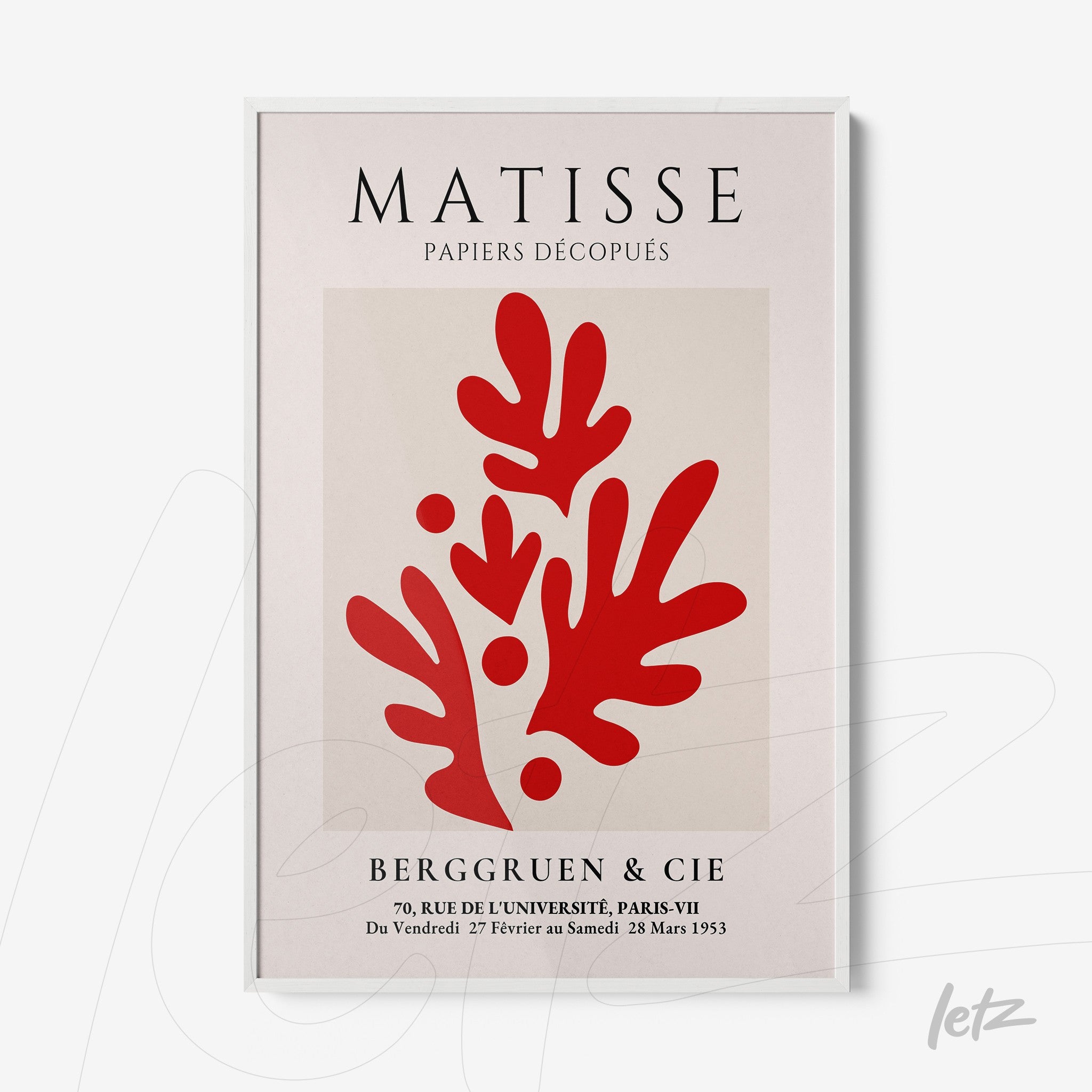 decorative wall art featuring modern red leaf shapes on a light background with white frame