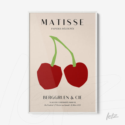 framed modern art of two red cherries on light background with white frame