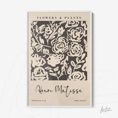 framed wall art featuring modern floral design with light background and white frame