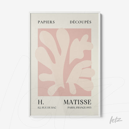 framed wall art featuring abstract leaf shapes in soft tones with vintage text and white frame