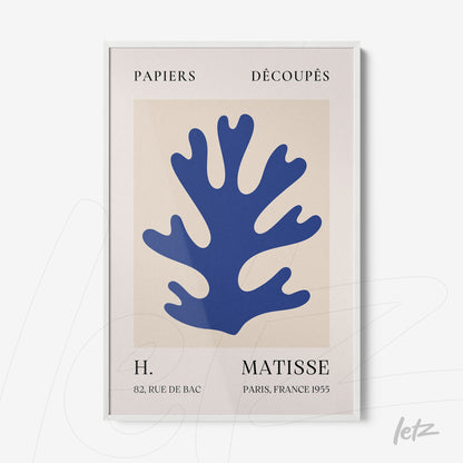 framed modern art piece featuring blue coral shape on a light background with white borders