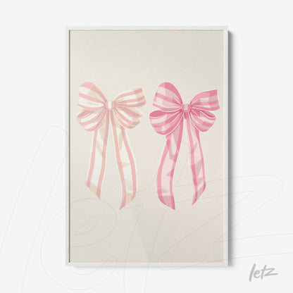 framed wall art featuring pink bows on a light background with white frame