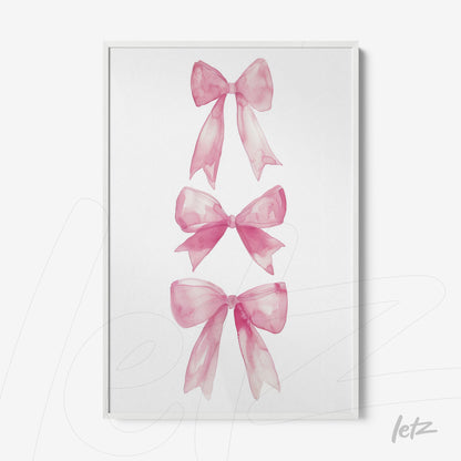 framed wall art featuring watercolor illustrations of pink bows on a white background with white frame
