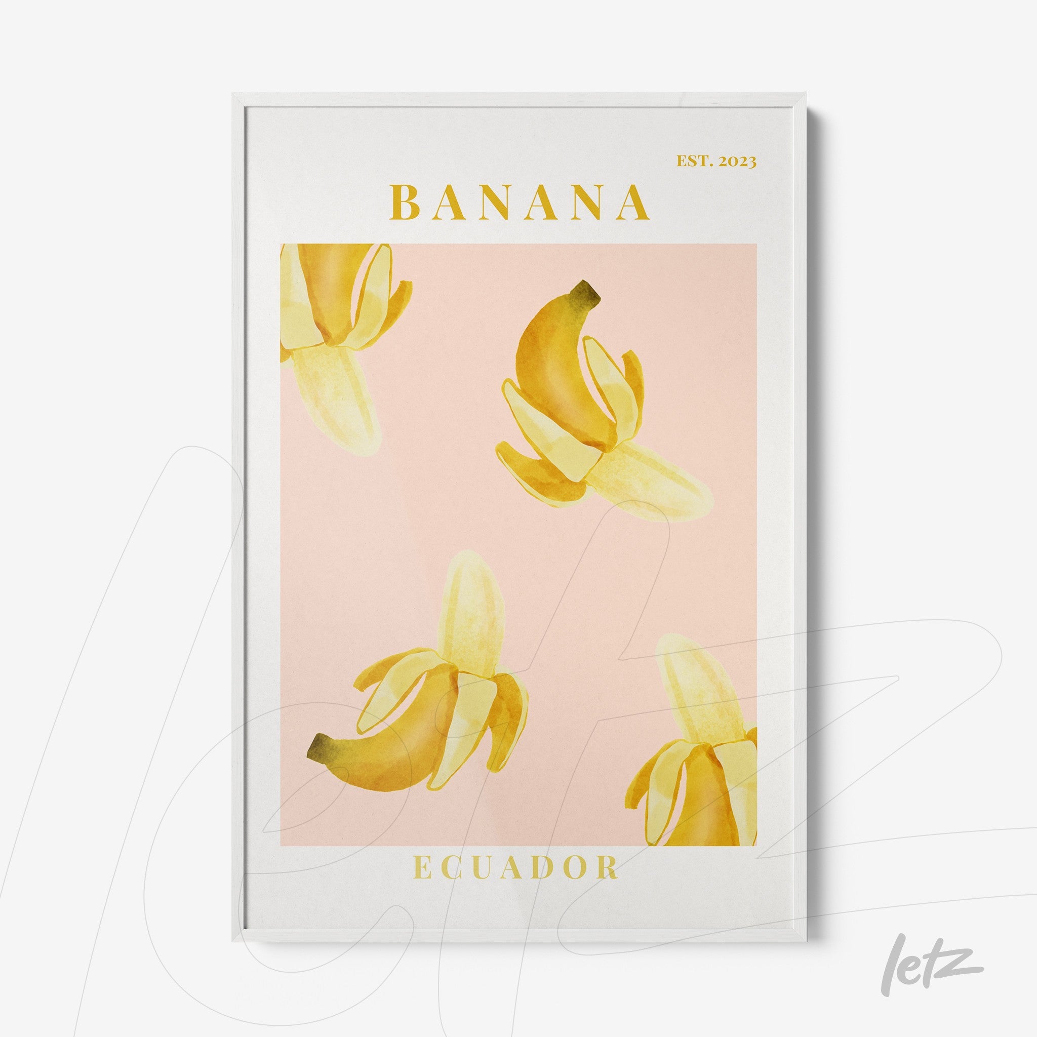 framed art featuring yellow bananas on a pink background with 'BANANA' and 'ECUADOR' in gold lettering and white frame