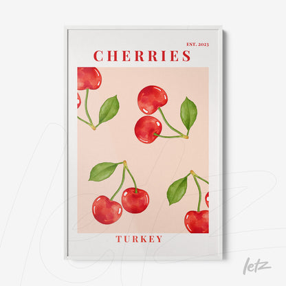 framed art featuring red cherries on a pink background with a white frame