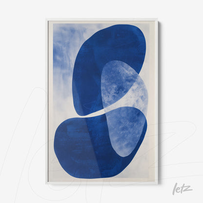 framed wall art featuring abstract design in shades of blue with organic shapes on light background