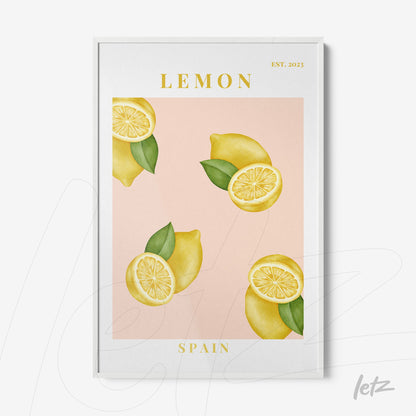 framed art featuring lemons on a pink background with white frame and golden text